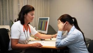 NCCRM Doctor discussing cancer diagnosis with patient